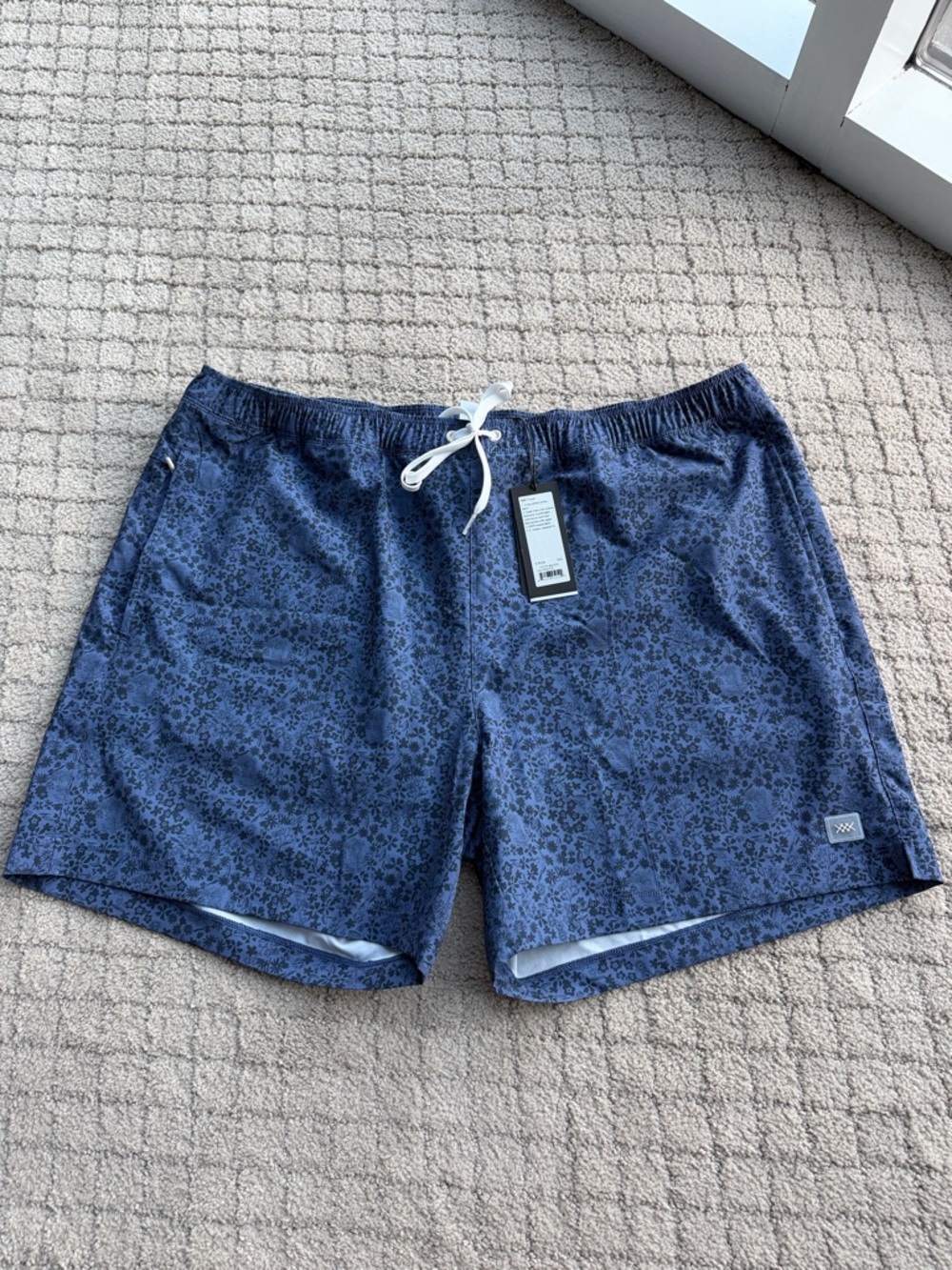 RHONE Navy Blue Floral Swim Trunks with White Drawstring